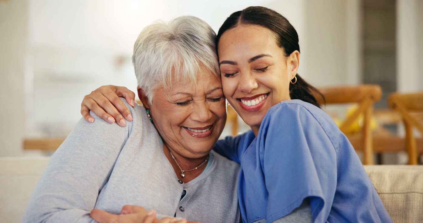 In-Home Care Spring Valley CA caretaker hugs her grandmother
