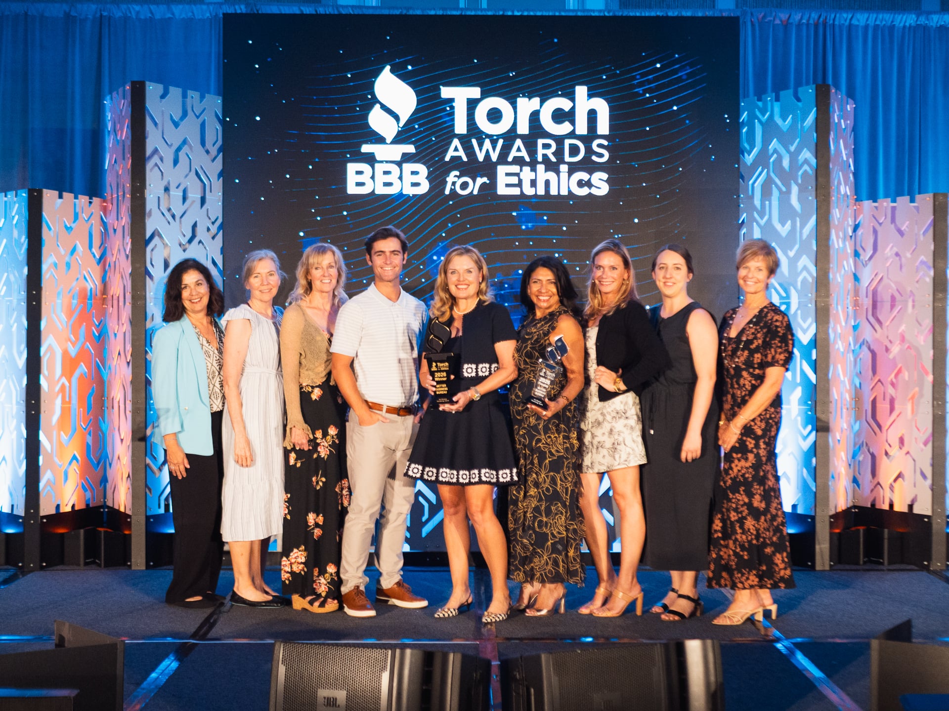 Staff of At Home Nursing Care Accept the BBB Torch Award for Ethics in Business
